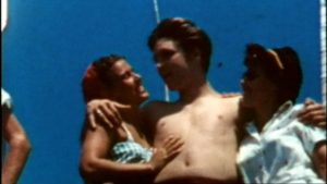 Elvis in july 12 1956 in Biloxi ( Mississippi ) first vacation since the beginning of his career in summer 1954.Here with his girlfriend June Juanico.