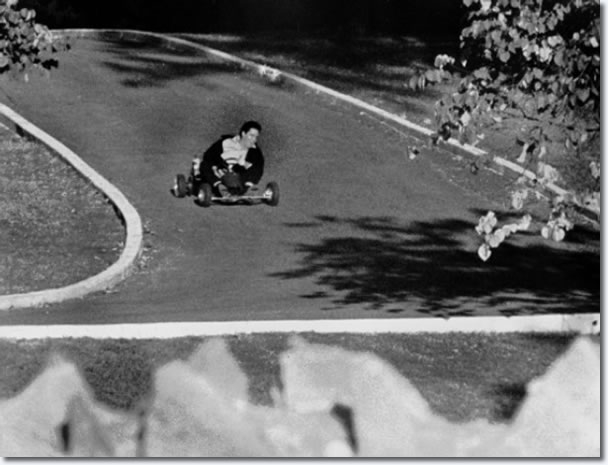 Elvis-was-seen-driving-go-cart-outside-Graceland.