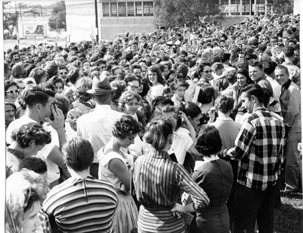 Fans-wait-in-line-to-see-Elvis-Presley-perform-at-the-Sam-Houston-Coliseum-in-Houston.-October-13-1956.
