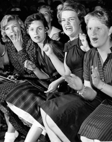 Fans-watch-Elvis-Presley-perform-at-the-Sam-Houston-Coliseum-in-Houston.-October-13