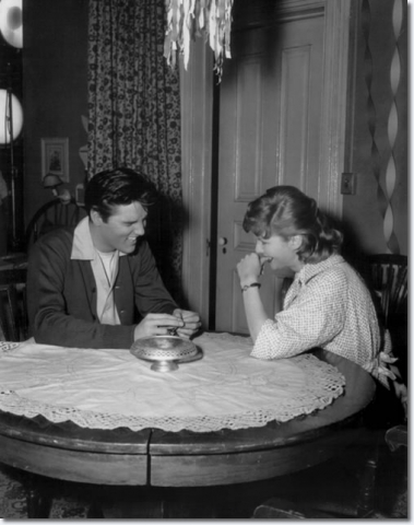 Elvis and Jan Shepard share a joke between takes at Paramount Studios, Hollywood. January 21, 1958.