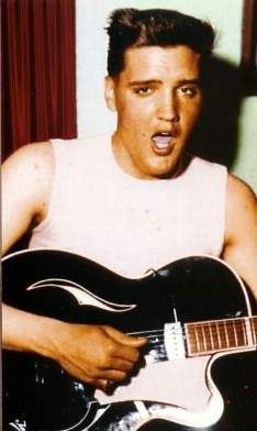 Elvis-at-his-Germany-home-in-january-4-1959-playing-electric-guitar.