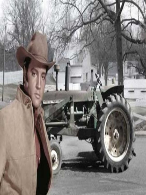 27-Elvis With His John Deere From His Circle G Ranch