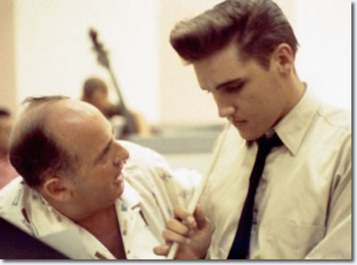 Elvis Presley and Colonel Tom Parker.