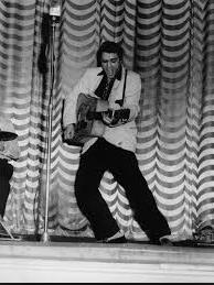 DJ and Elvis presley onstage at the Carolina Theatre in Charlotte, NC - Feb. 10, 1956