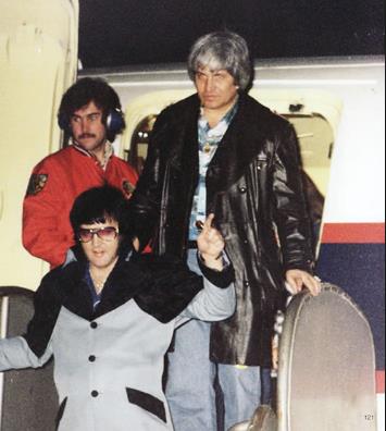 Elvis Presley departing the Lisa Marie and heading to his hotel shortly after midnight February 20 1977