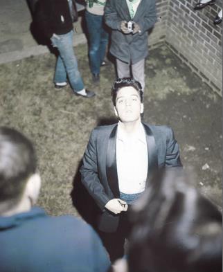 Elvis Presley at the gates of Graceland - March 12, 1960 2