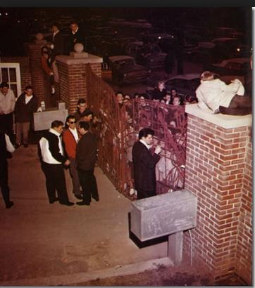 Elvis Presley at the gates of Graceland - March 12, 1960