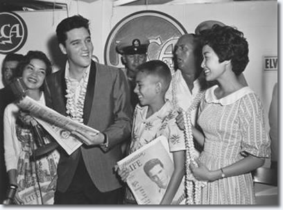 Elvis at a press conference about his benefit concert for the USS Arizona Memorial.