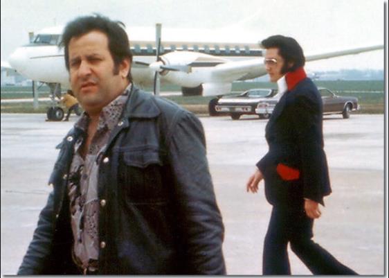 Joe Esposito with Elvis Presley at the Memphis airport March 18, 1974