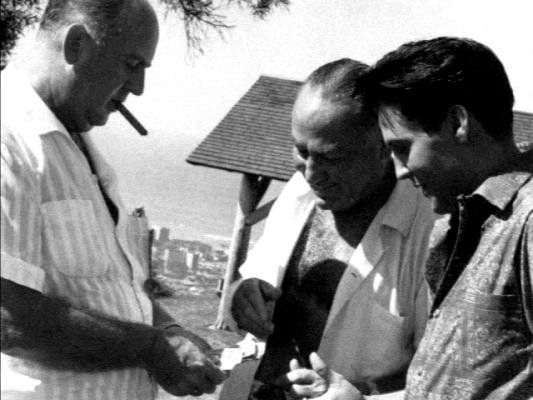 Colonel Parker chatting with Elvis and Producer Hal. B Wallis April 17, 1961
