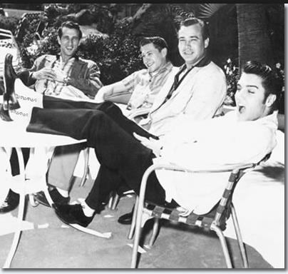 Elvis Presley Relaxing by the pool between shows April 26, 1956