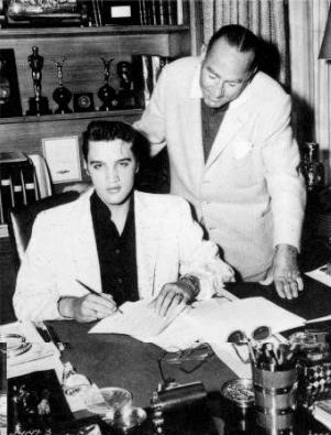 april 6 1956 with the famous Producer Hal Wallis. Elvis Presley