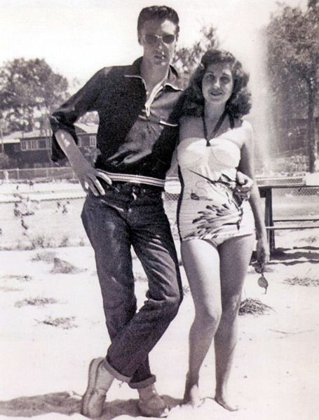 10- 1953, Olive Branch, MS. 18-year-old Elvis posing with a friend from school at the water park Maywood Beach.
