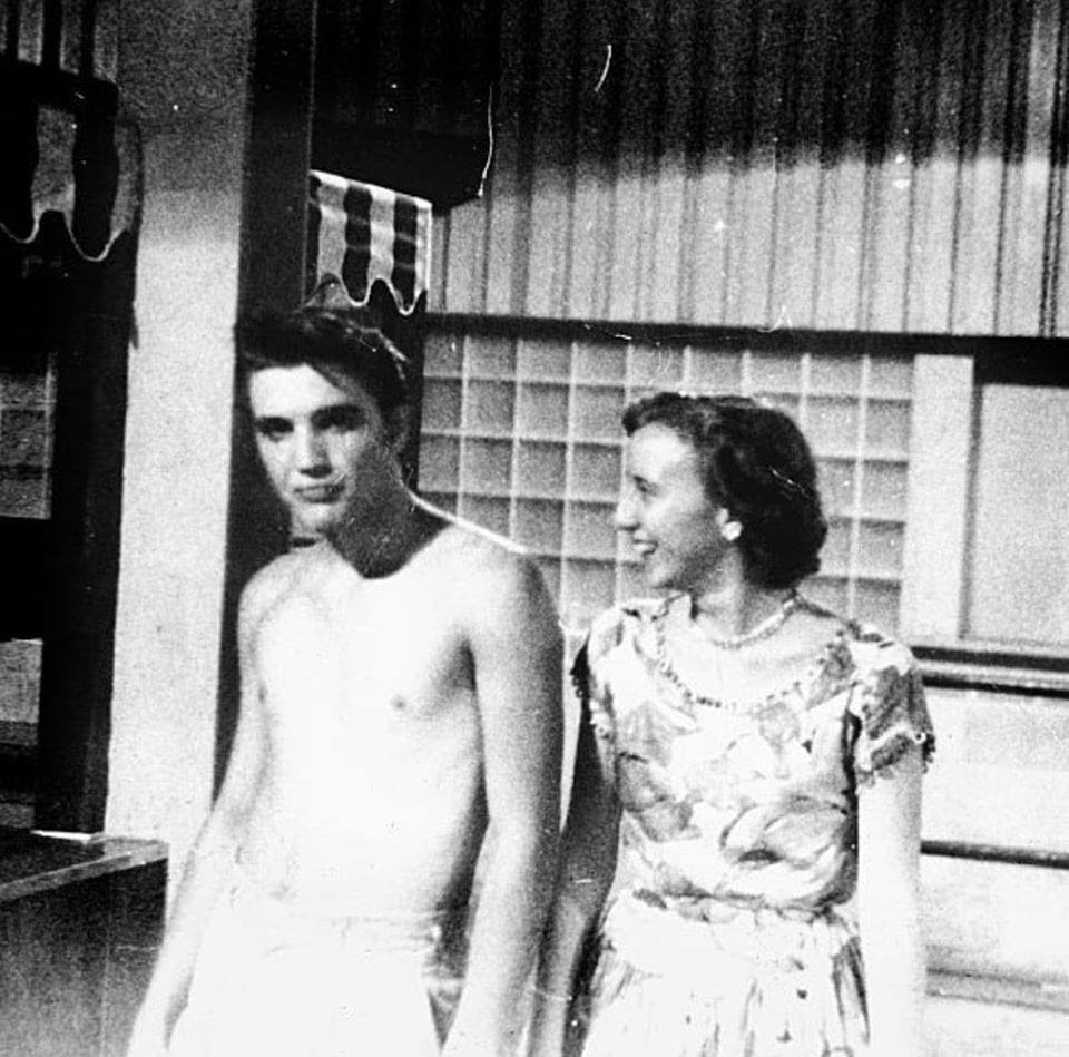 With fan Ardys Bell Clawson backstage at Gator Stadium Baseball Park on July 28, 1955. Ardys' brother took this photo.