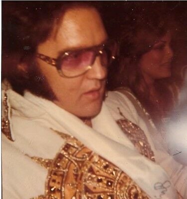 Elvis and Ginger in the limo heading for yet another concert, 1977