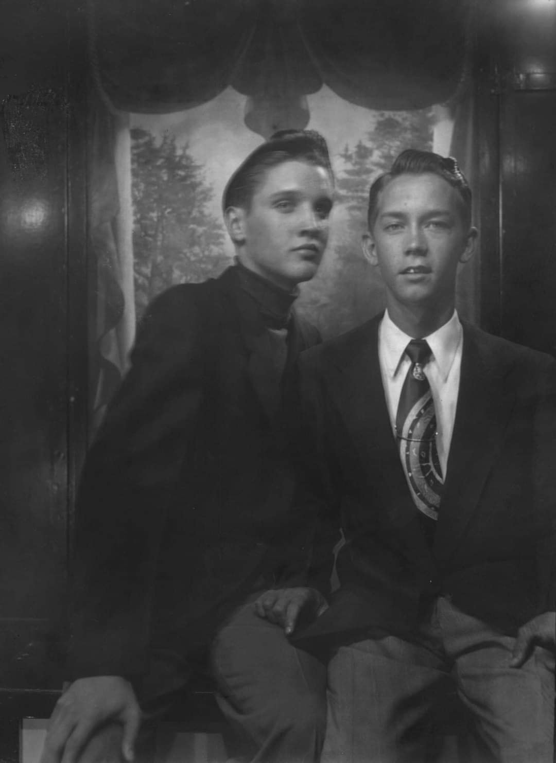 Elvis and his cousin Gene Smith at Loew's State Theater on Main Street, Memphis
