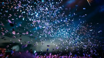 Dramatic concert lighting and stage production representing the Elvis Evolution live immersive show in London